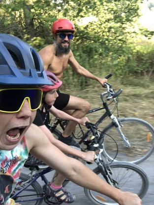 people on wheels riding bikes