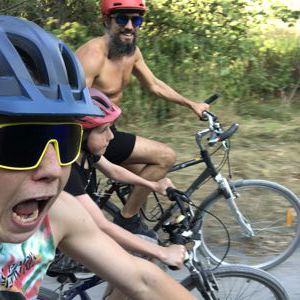 people on wheels riding bikes